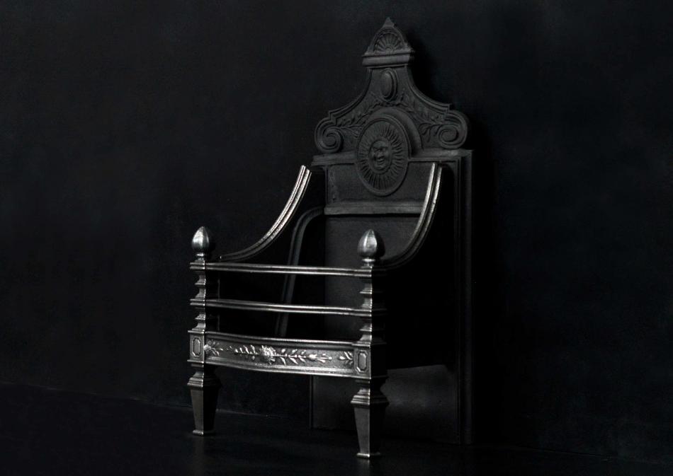 A cast iron decorative firegrate