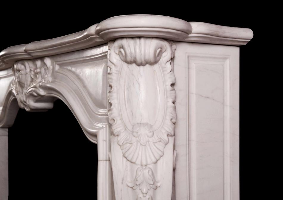 A French transitional Louis XIV/XV marble fireplace