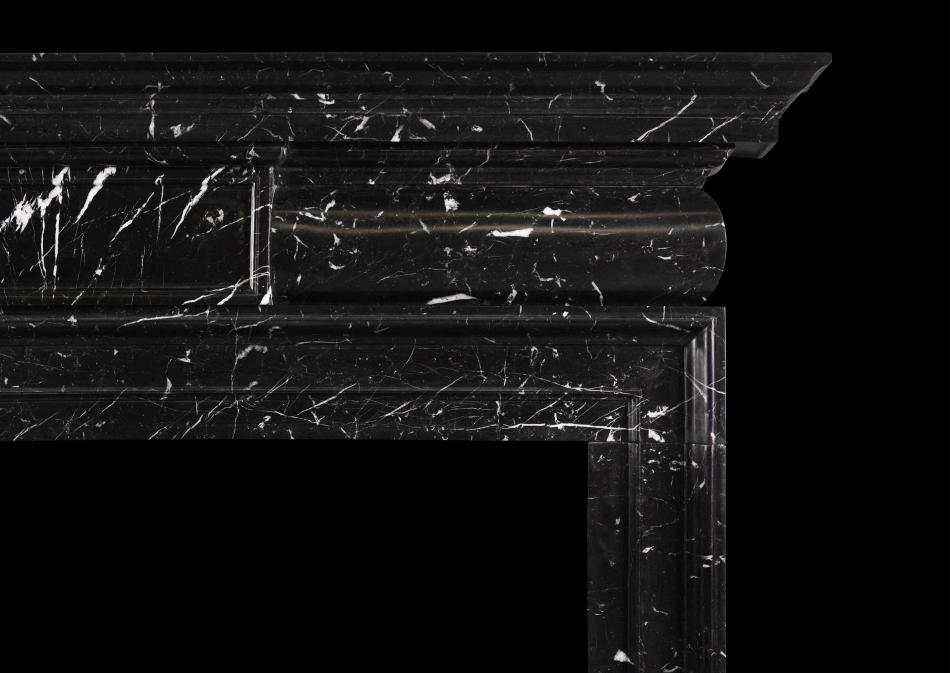 A Georgian Style marble fireplace in Nero Marquina
