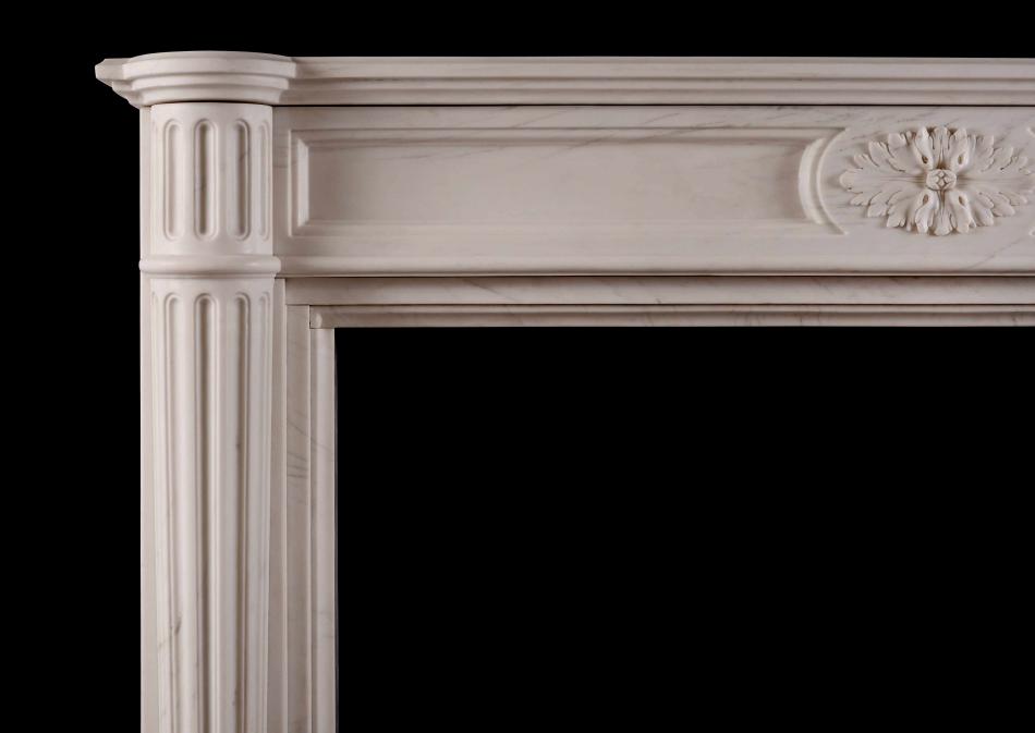 A French Louis XVI style white marble fireplace