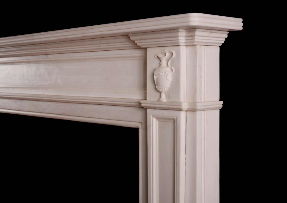 A Regency style white marble fireplace