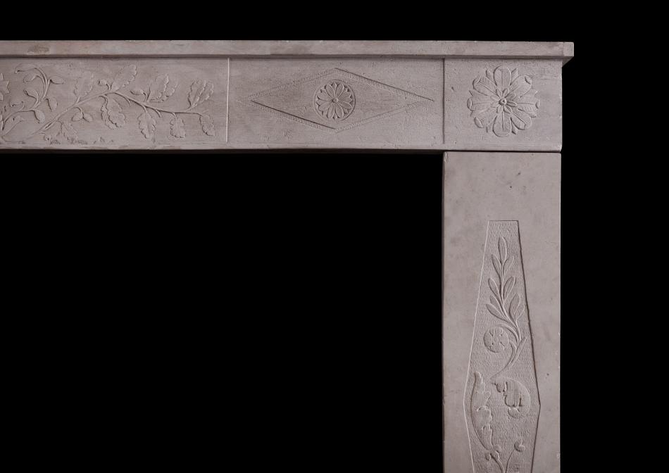 A 19th century French limestone fireplace