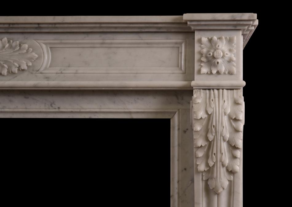A French Carrara marble fireplace in the Louis XVI style
