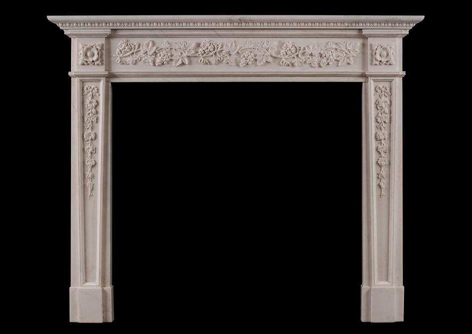 An English Regency style white marble fireplace