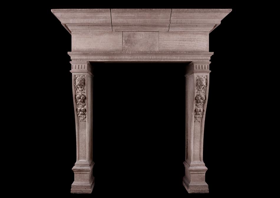 A rustic French limestone fireplace