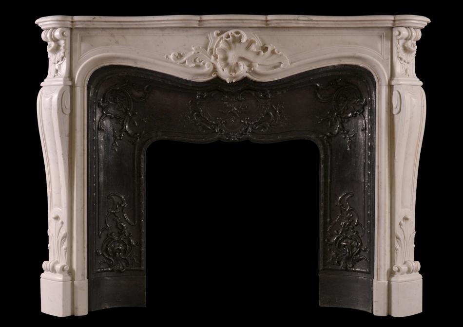 A French Louis XV style antique fireplace