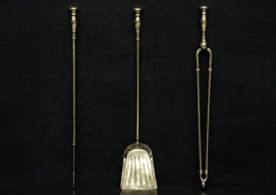 A simple set of brass firetools