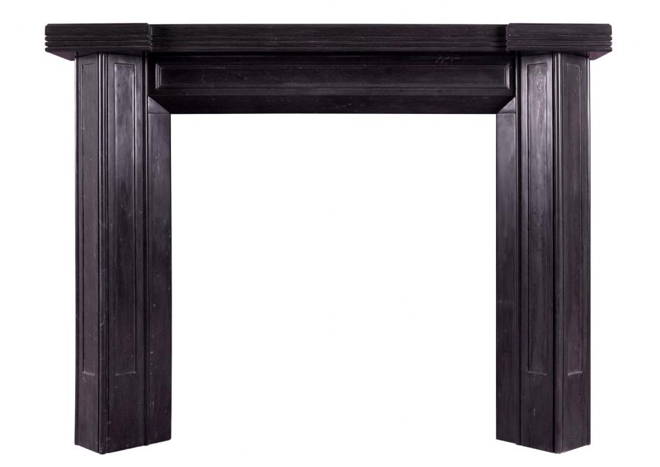 A black marble Art Deco style fireplace
