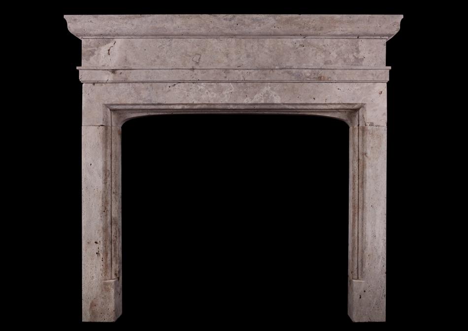 A rustic English fireplace in the Gothic manner