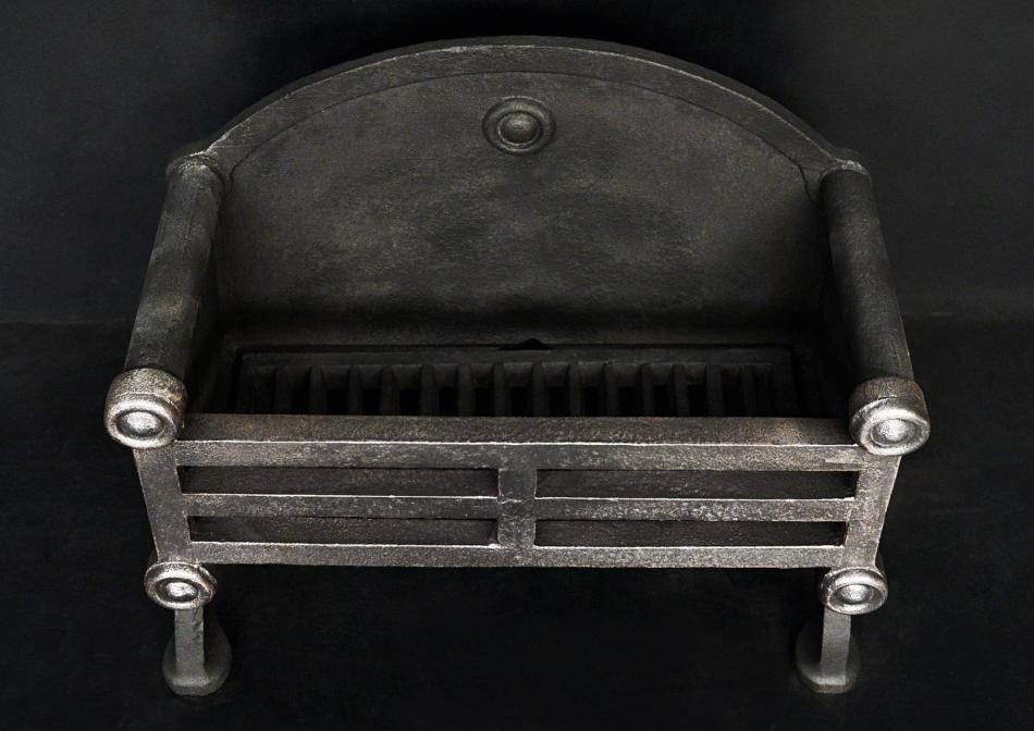 A polished cast iron firegrate