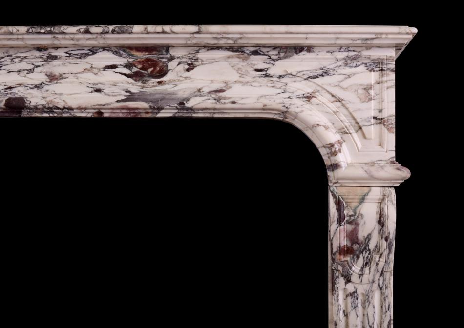 A French Louis XIV Breche Violette marble fireplace