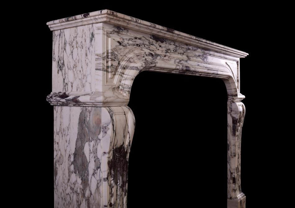 A French Louis XIV Breche Violette marble fireplace