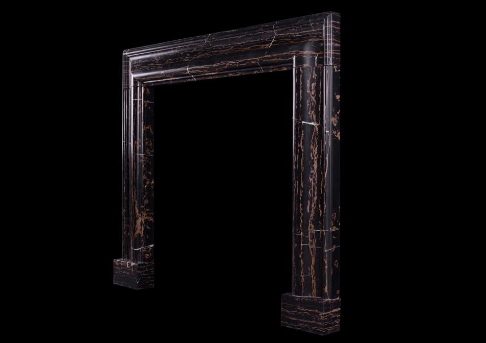 A striking bolection fireplace in Portora marble