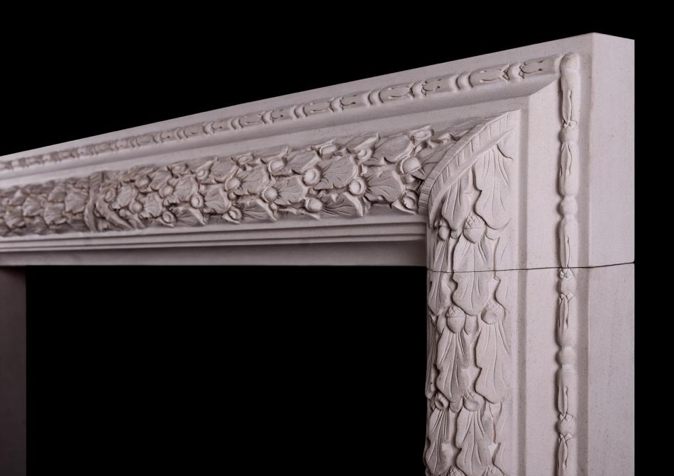 An elegant carved bolection fireplace in limestone