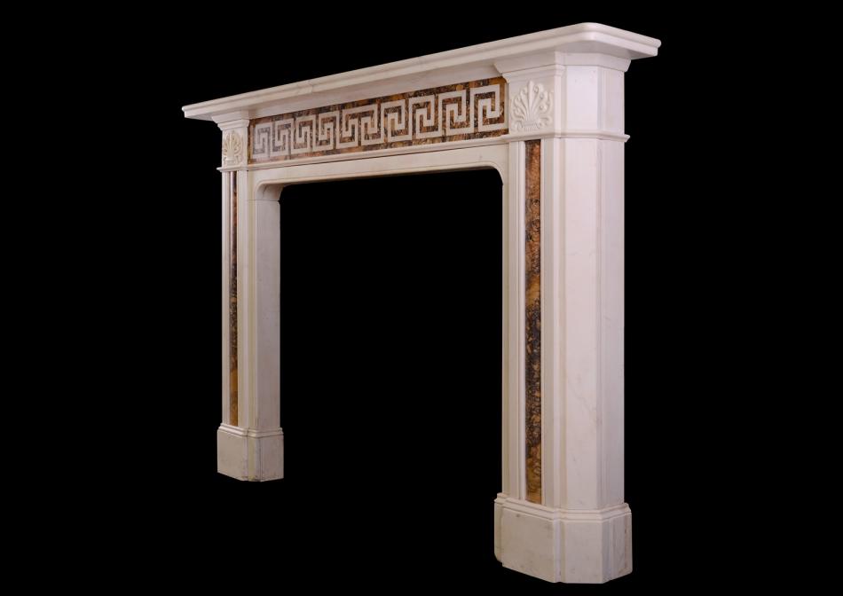 An early 19th century Statuary and Siena marble fireplace