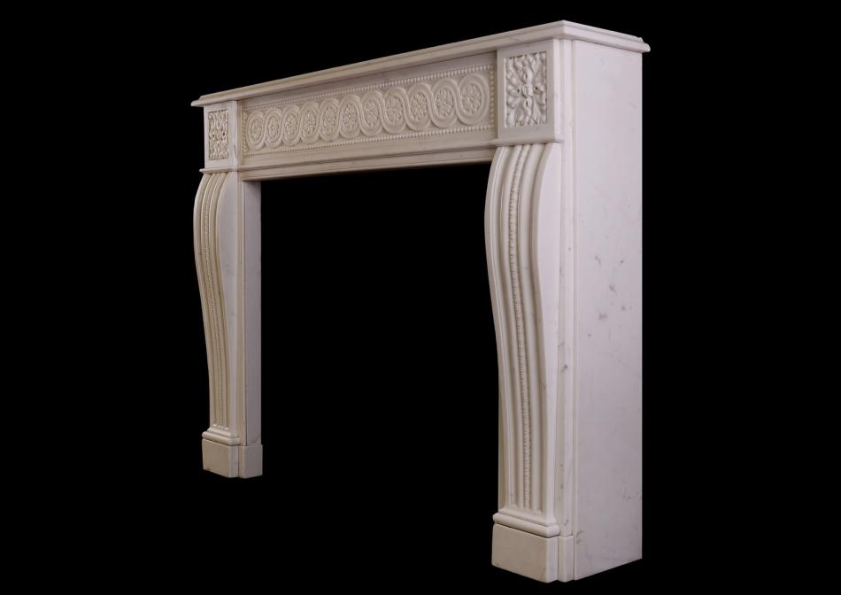 A carved Italian Statuary marble fireplace