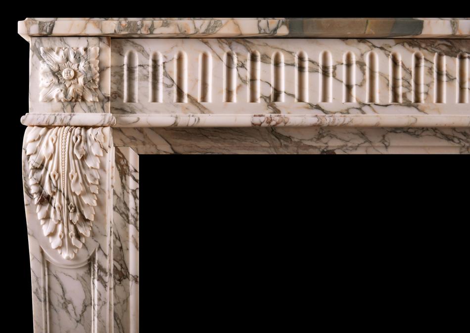 A French Louis XVI fireplace in Serravezza Breccia marble