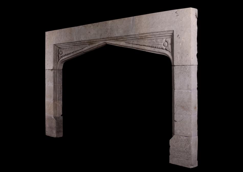 A substantial Gothic stone fireplace