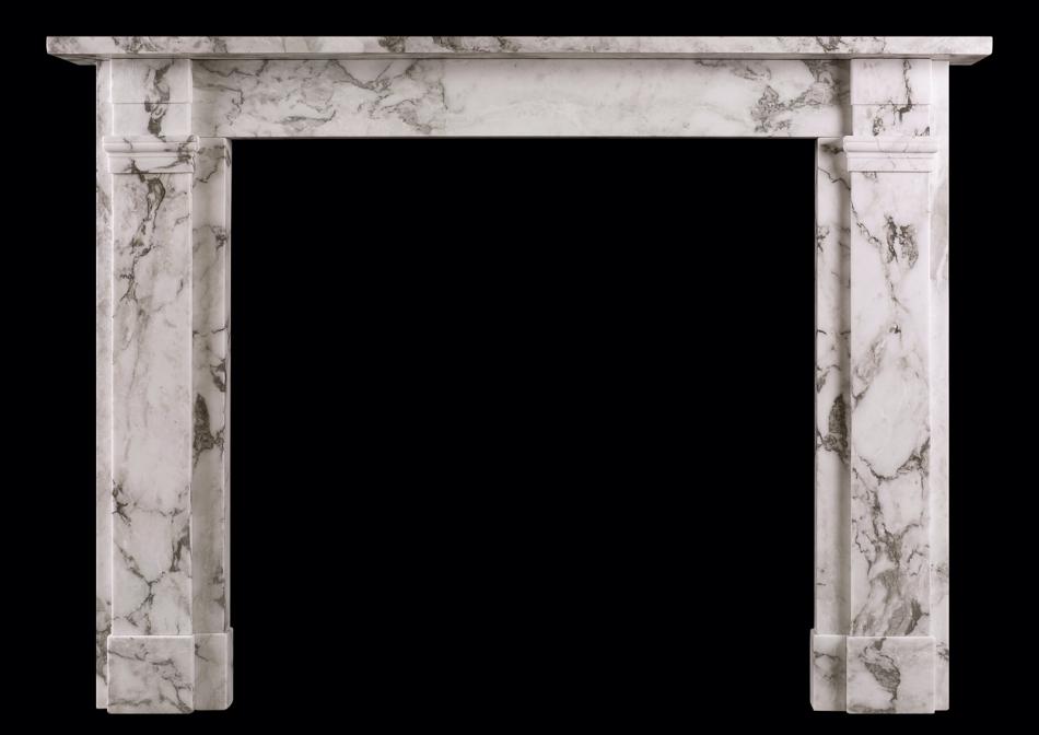 An Arabescato marble fireplace in the Regency manner