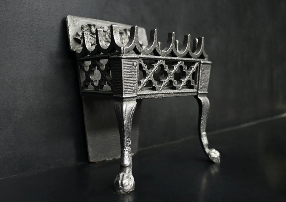 A Neo-Gothic style firegrate