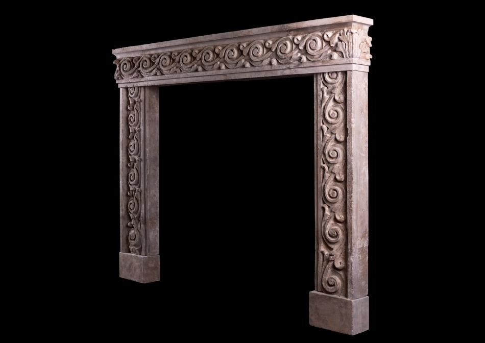 An impressive carved stone Italian fireplace