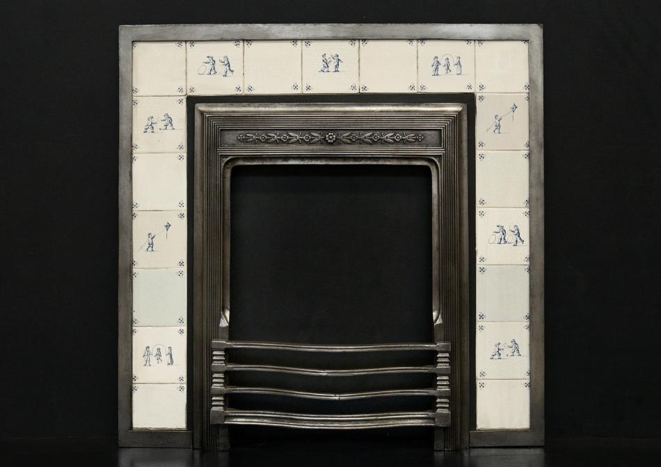A decorative cast iron fireplace insert with Delft tiles