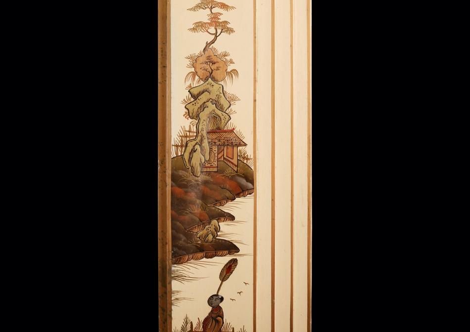 An Art Deco Chinoisorie painter fireplace