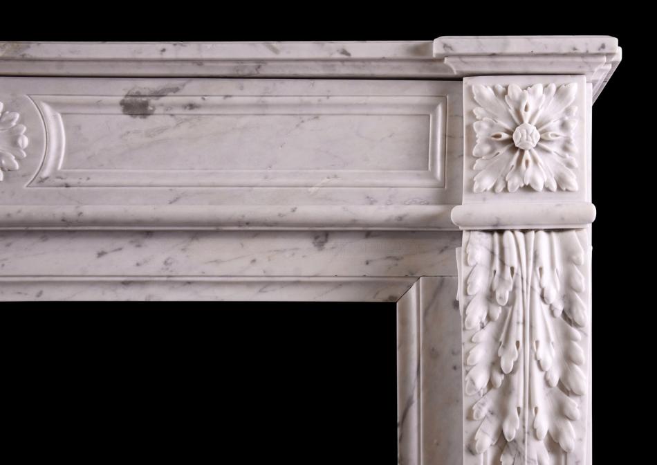 A Louis XVI style Carrara marble fireplace