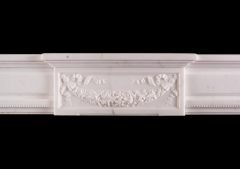 A Statuary marble Louis XVI style fireplace