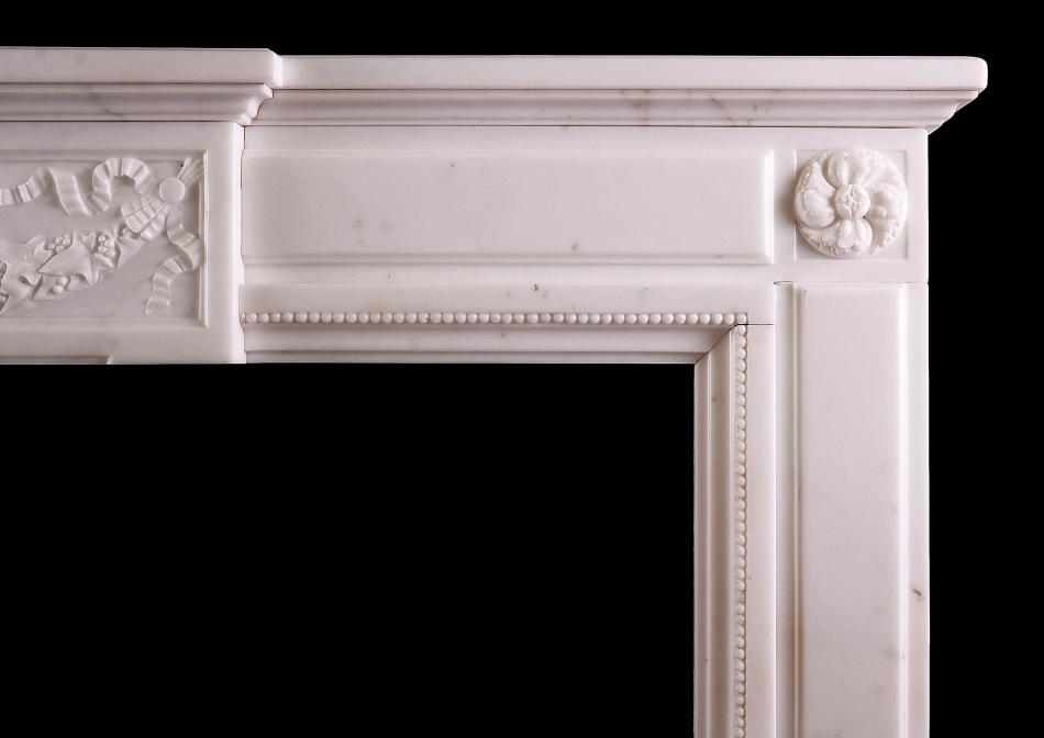 A Statuary marble Louis XVI style fireplace