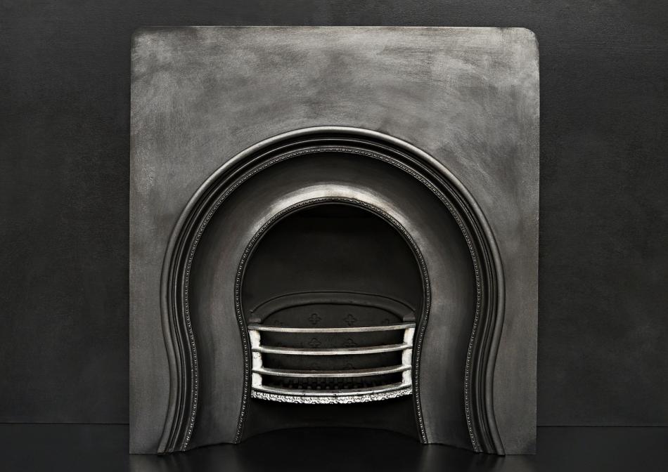 An Arts & Crafts fireplace insert