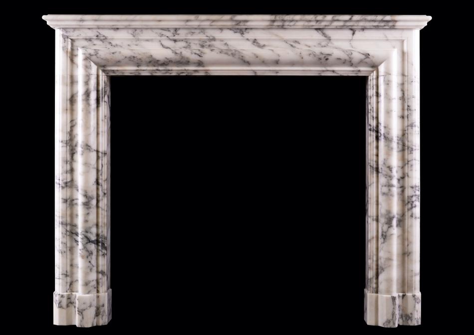 An Architectural fireplace in Arabescato marble