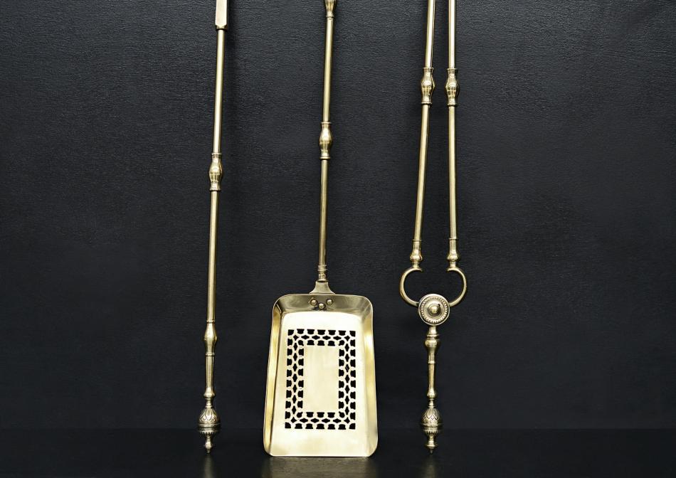 A set of Georgian polished brass firetools