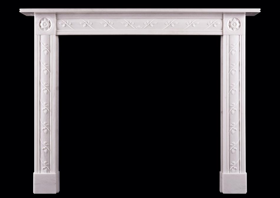 A delicate English Regency white marble fireplace