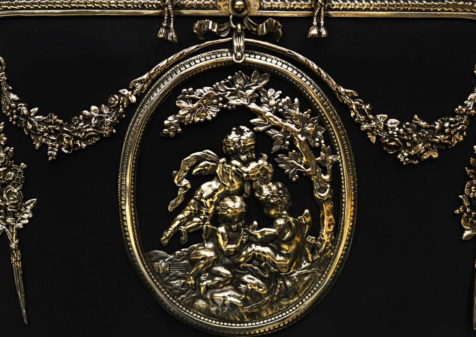 An ornate French Rococo brass firescreen