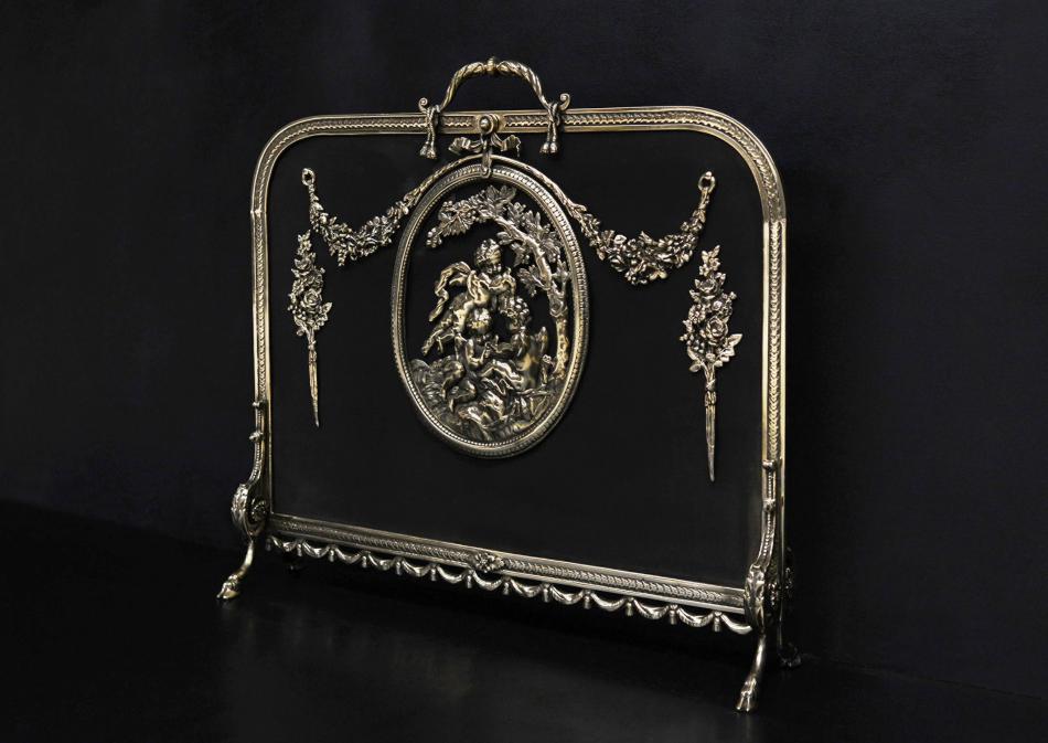 An ornate French Rococo brass firescreen