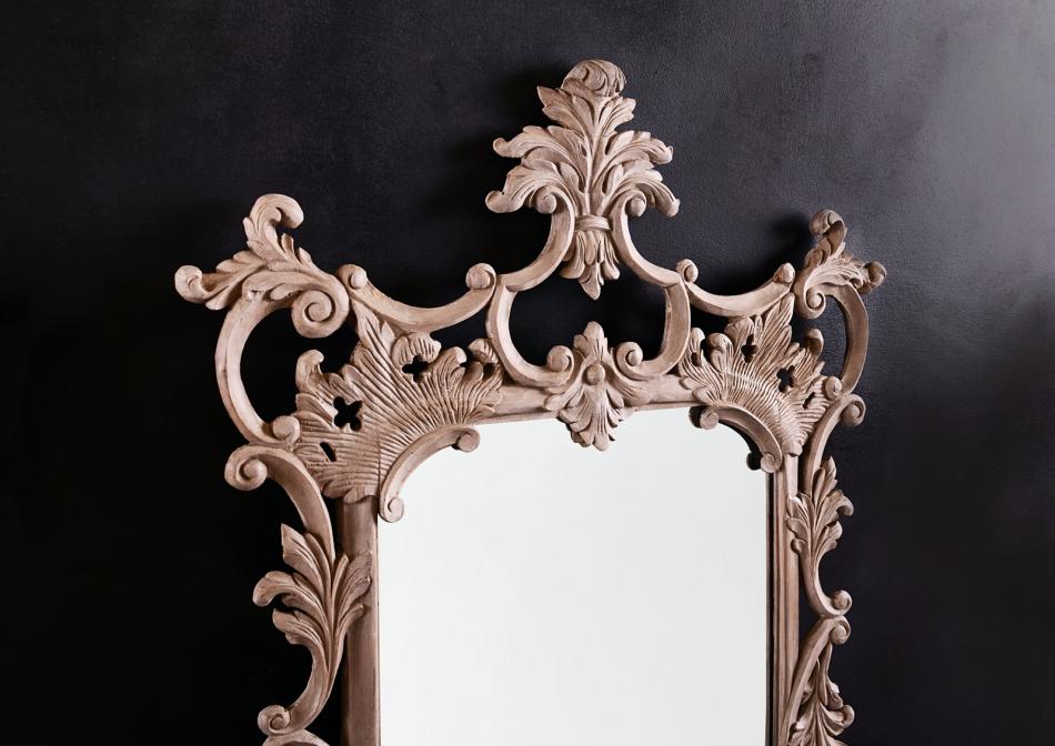 A pair of hand carved English mirrors