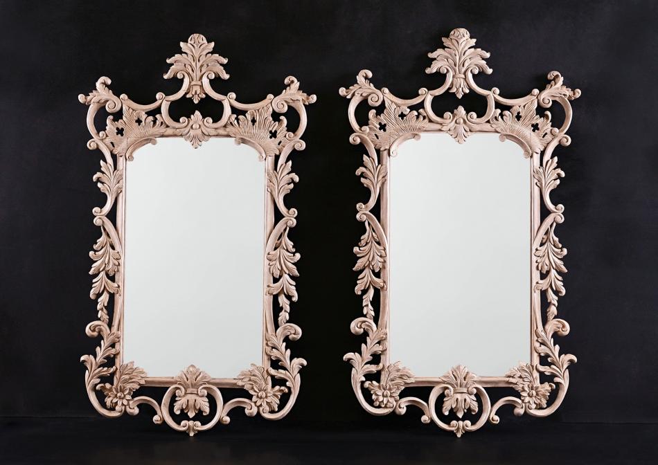 A pair of hand carved English mirrors