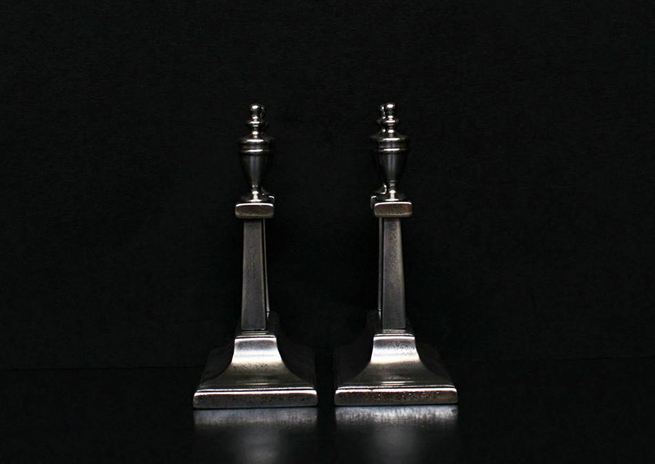 A pair of English firetool rests