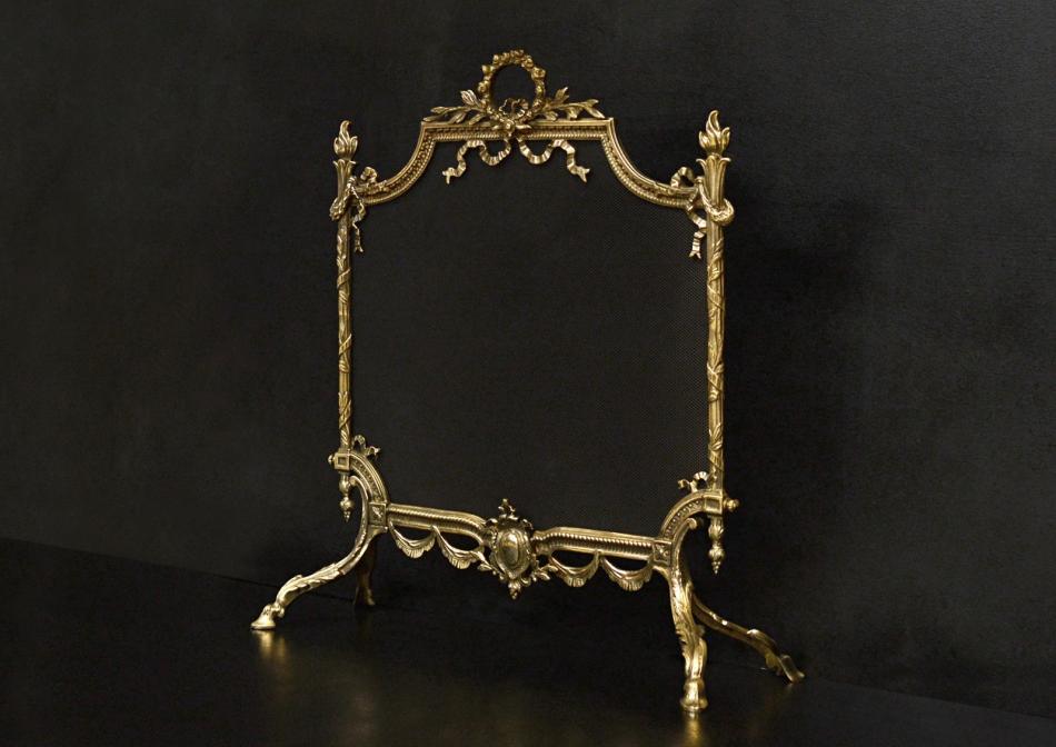 A 19th century English Regency style brass firescreen