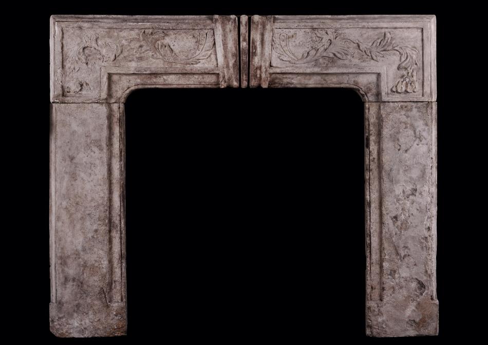 A period Queen Anne limestone fireplace