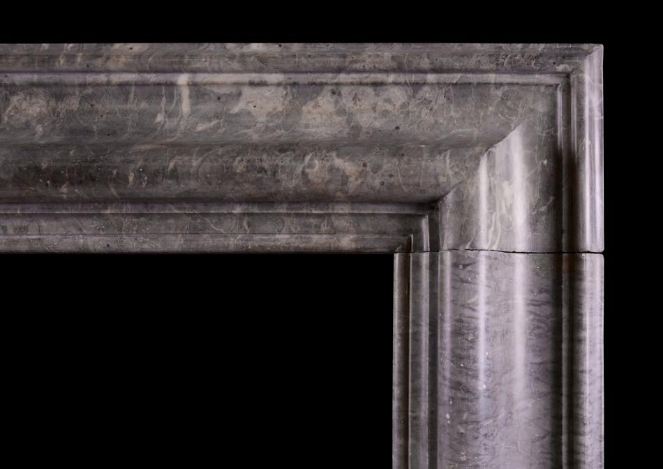 An Antique Bolection Fireplace In Grey Marble