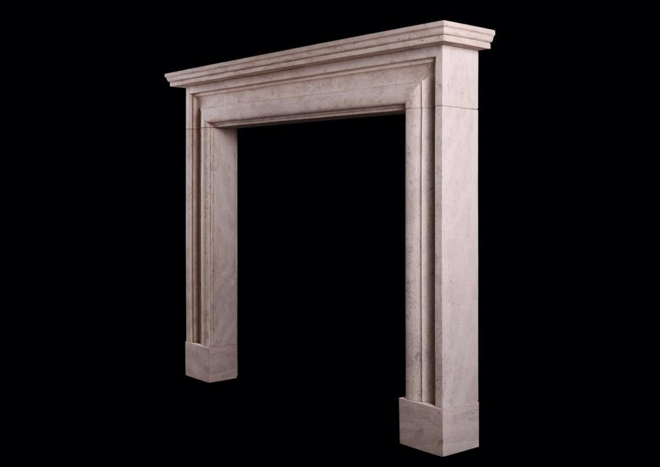 An English moulded bolection fireplace in Ancaster stone