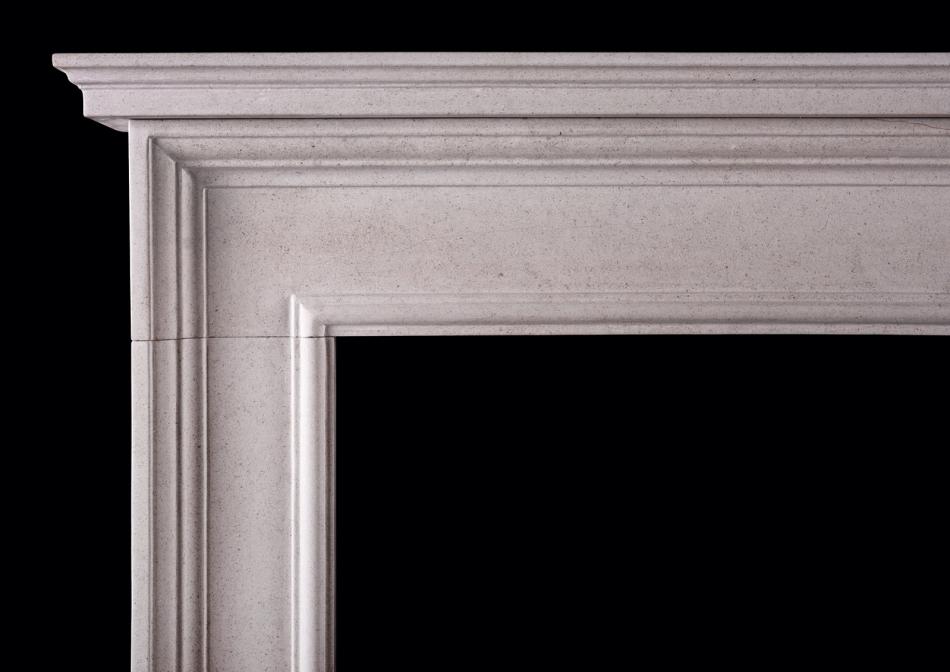 An architectural fireplace with moulded shelf