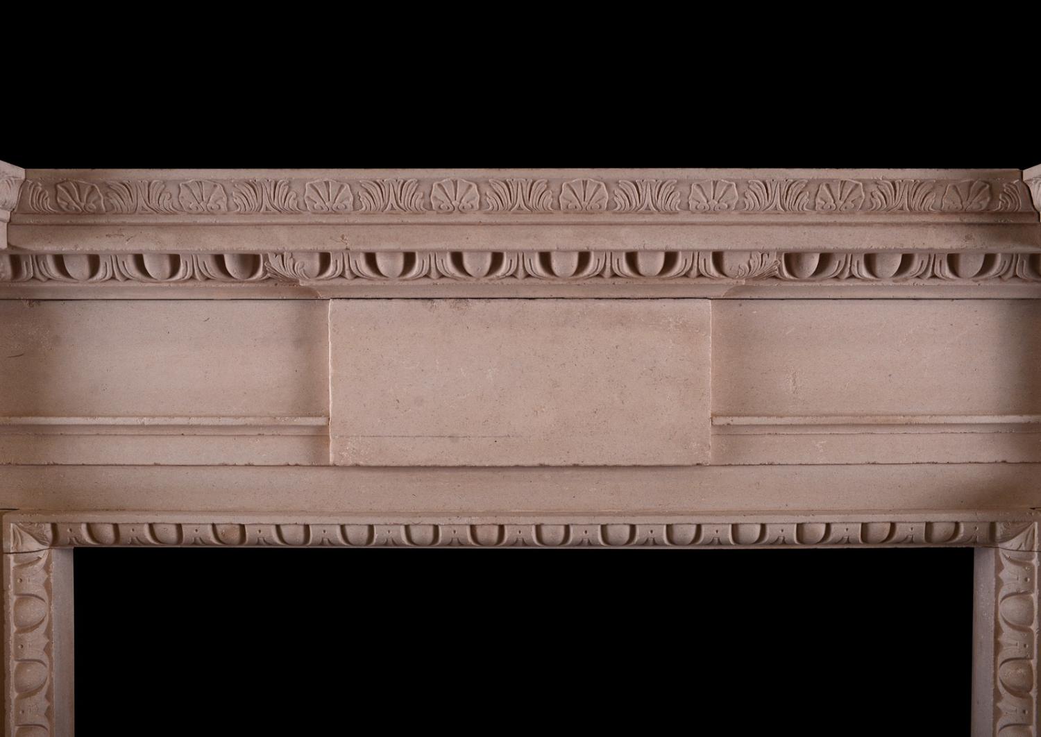 An English stone fireplace in the Georgian manner