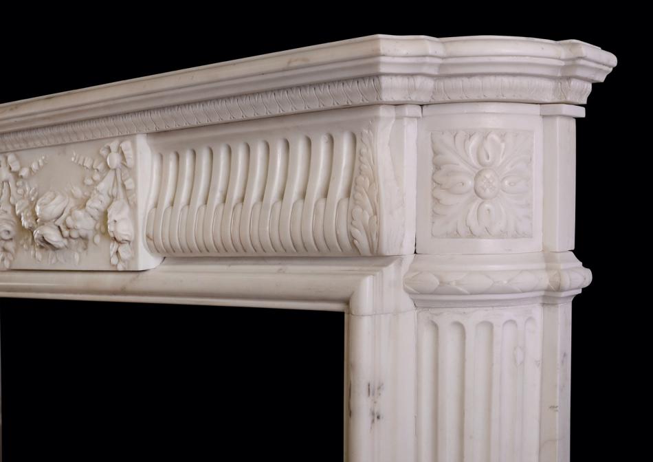 A fine quality French Statuary marble fireplace