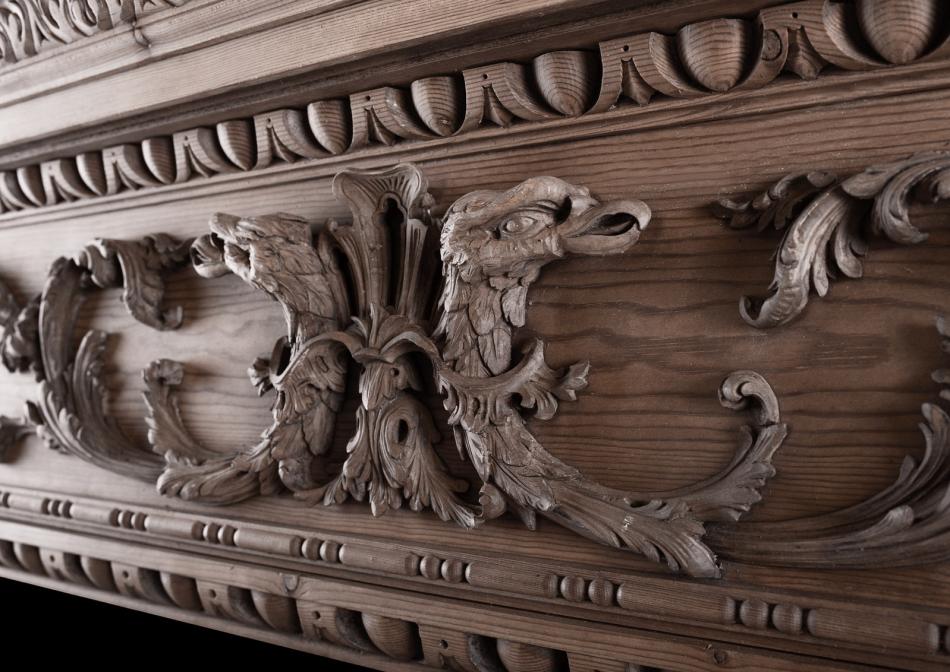 A fine quality carved pine fireplace