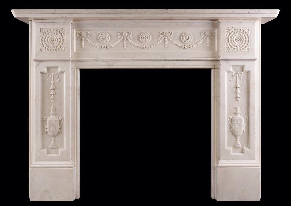 An early Victorian fireplace in white Statuary marble