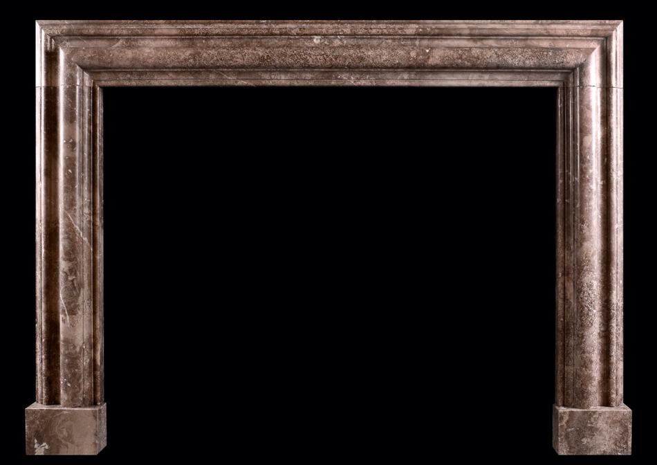 An English marble bolection fireplace