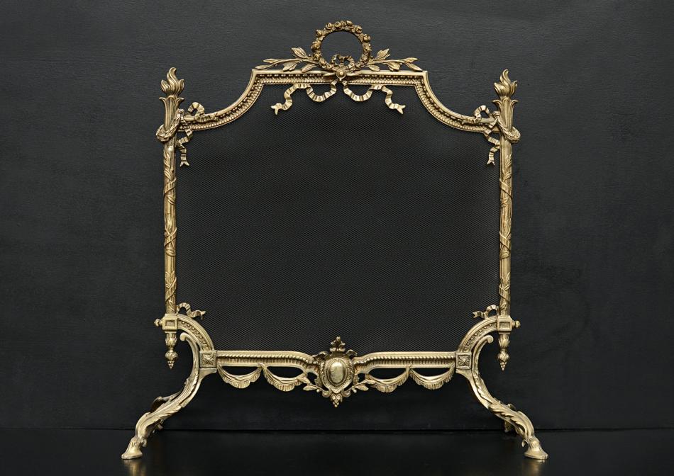A 19th century English Regency style brass firescreen